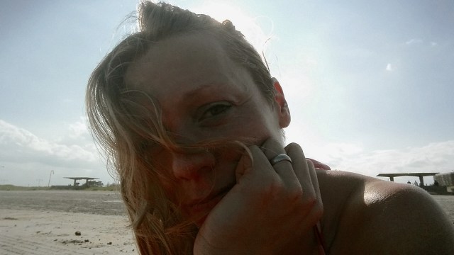 Pinching self by selfie