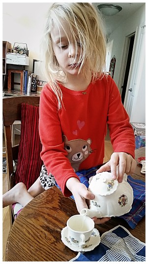 ClaraJane pouring tea